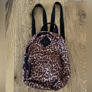 NWOT! Tilly’s mini leopard backpack.